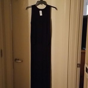 NWT Black Sleeveless top with a long tail